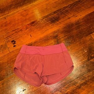 Dark red lululemon speed up 2.5 inch. No longer available on website.